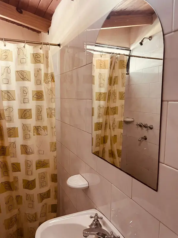 Baño exterior privado del bungalow
