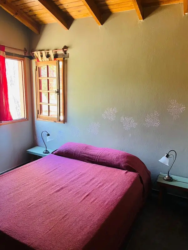 Dormitorio matrimonial de cabaña